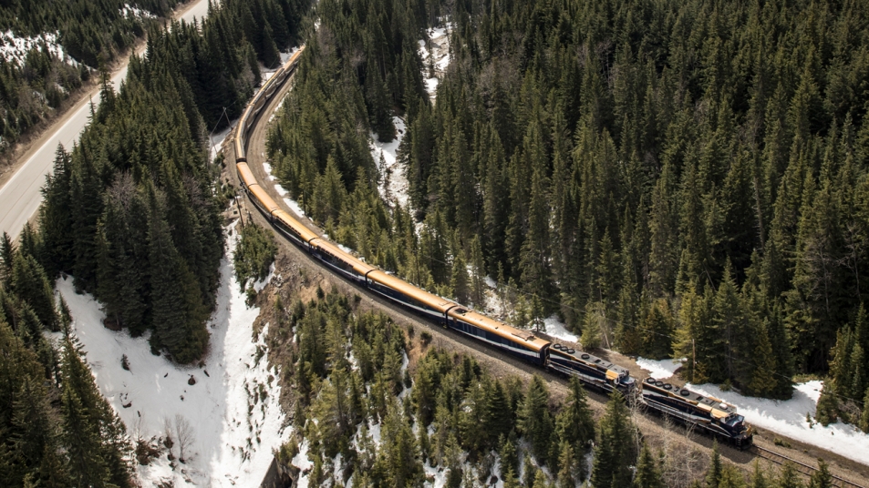 Rocky Mountaineer train crossing through Stoney Creek Bridge in the snow